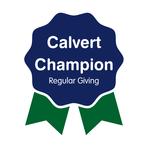 Dark blue and greem logo that looks like an award merit which says Calvert Champion Regular Giving